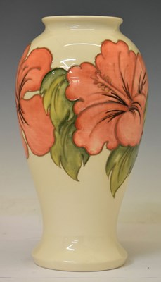 Lot 283 - Moorcroft Pottery - Hibiscus pattern baluster shaped vase