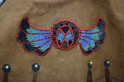Lot 257 - Group of Native American beadwork-decorated garments and accessories (Ex 'Bristol Savages')