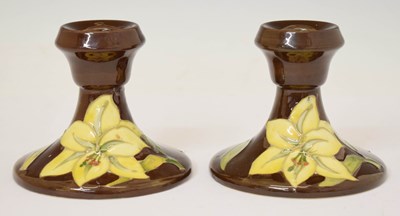 Lot 281 - Pair of Moorcroft low candlesticks