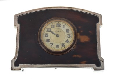 Lot 567 - George V silver mounted tortoiseshell boudoir clock