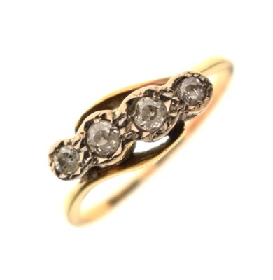 Lot 3 - Four-stone diamond crossover ring