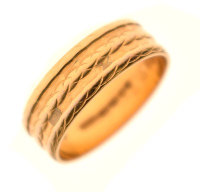 Lot 36 - 18ct gold patterned wedding band