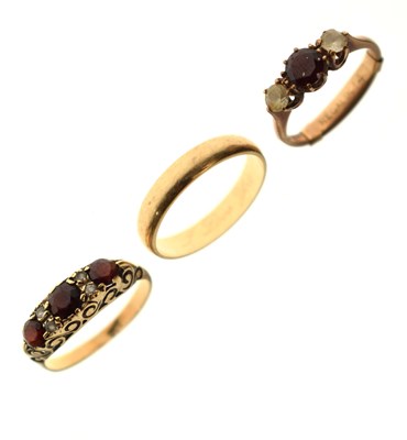 Lot 22 - Two garnet and white stone rings and a 9ct gold wedding band