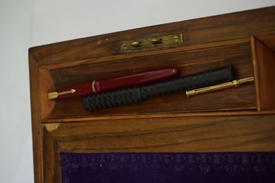 Lot 218 - Victorian walnut lap desk, a selection of gold nibbed fountain pens, etc
