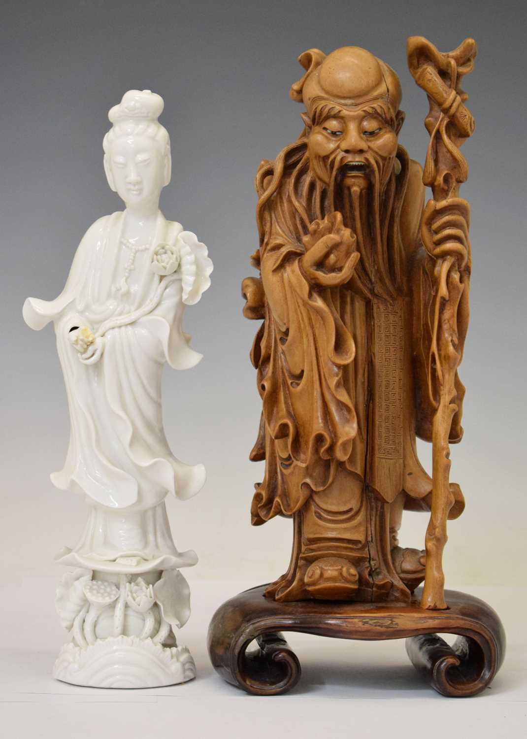 Lot 313 - Chinese carved rootwood figure of Shoulao and blanc de chine Kwanyin