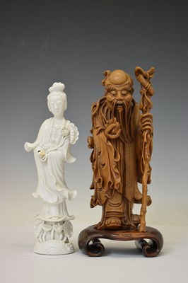Lot 313 - Chinese carved rootwood figure of Shoulao and blanc de chine Kwanyin