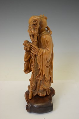 Lot 313 - Chinese carved rootwood figure of Shoulao and blanc de chine Kwanyin
