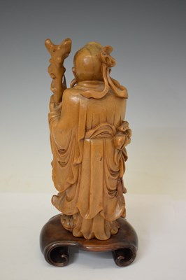 Lot 313 - Chinese carved rootwood figure of Shoulao and blanc de chine Kwanyin