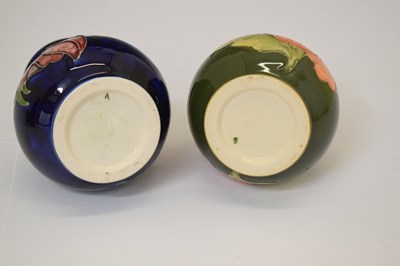 Lot 364 - Moorcroft pottery - An 'Anemone' ovoid vase, two 'Hibiscus' pattern, and a 'Bermuda Lily' vase