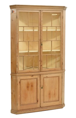 Lot 561 - Pitch pine floorstanding corner cabinet