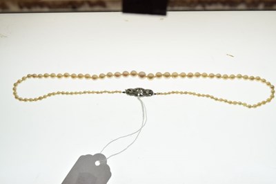 Lot 75 - Cultured pearl necklace, diamond set clasp