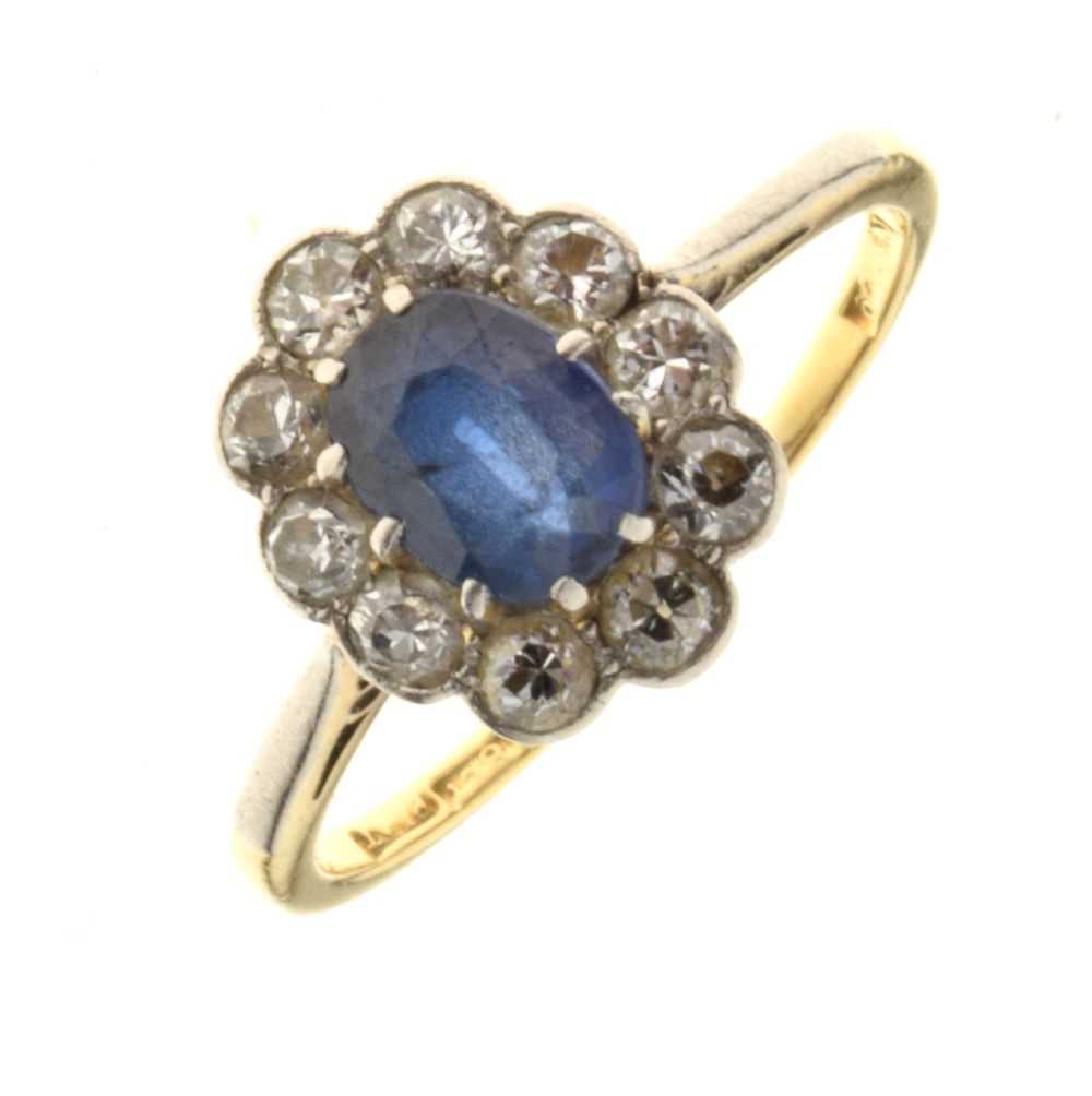 Lot 20 - Sapphire and diamond cluster ring