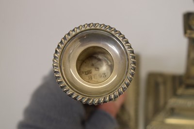 Lot 159 - Pair of silver candlesticks in the neoclassical taste of square columner form