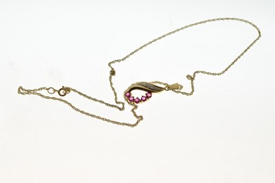 Lot 82 - 9ct ruby and diamond pendant on chain