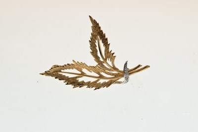 Lot 63 - 9ct gold diamond set leaf or feather-design brooch