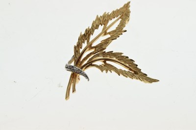 Lot 63 - 9ct gold diamond set leaf or feather-design brooch