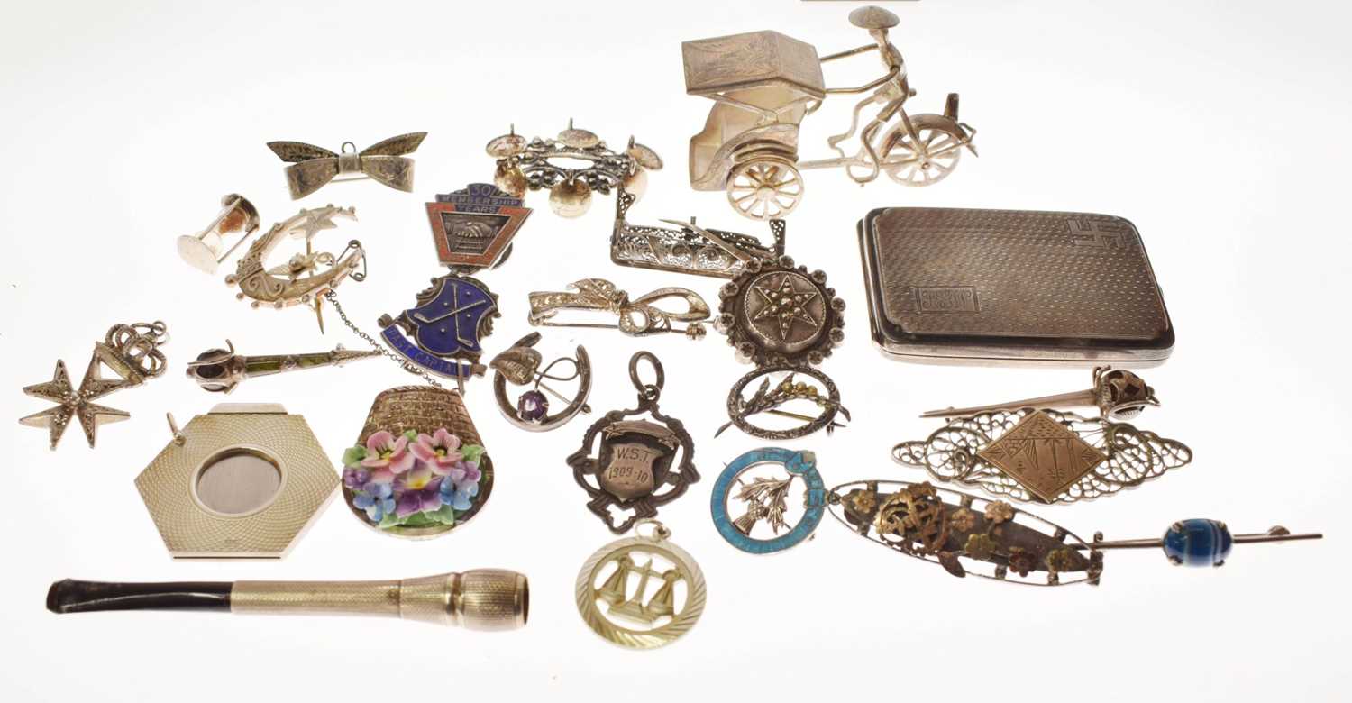 Lot 205 - Elizabeth II silver cigar cutter, silver fob, selection of silver brooches and white metal examples