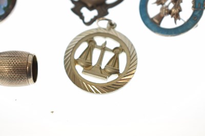 Lot 205 - Elizabeth II silver cigar cutter, silver fob, selection of silver brooches and white metal examples