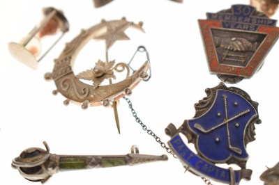 Lot 205 - Elizabeth II silver cigar cutter, silver fob, selection of silver brooches and white metal examples