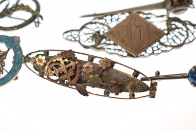 Lot 205 - Elizabeth II silver cigar cutter, silver fob, selection of silver brooches and white metal examples