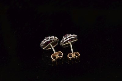 Lot 123 - Pair of ruby and diamond cluster ear studs