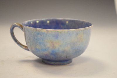 Lot 399 - Ruskin pottery tea cup in  lustre blue glaze