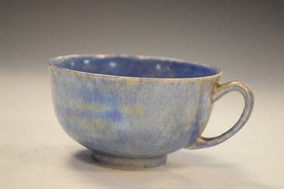 Lot 399 - Ruskin pottery tea cup in  lustre blue glaze