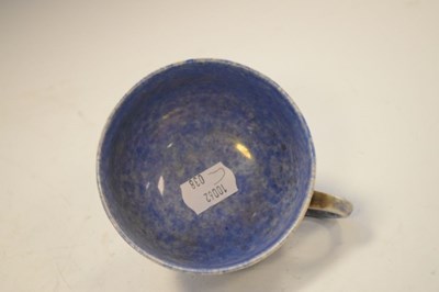 Lot 399 - Ruskin pottery tea cup in  lustre blue glaze