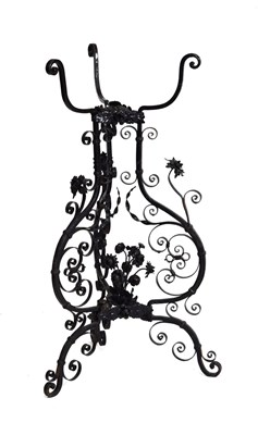 Lot 653 - French wrought iron stand, circa 1900