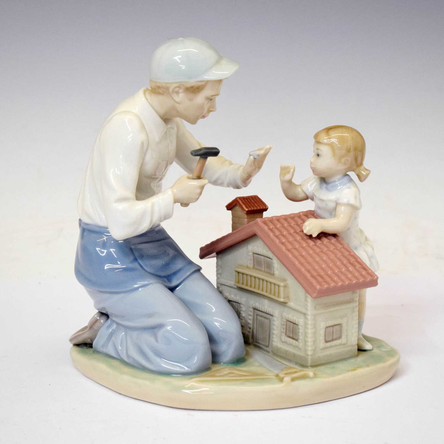 Lot 653 - Lladro - Porcelain figure group, 'A New Dolls House', 5139