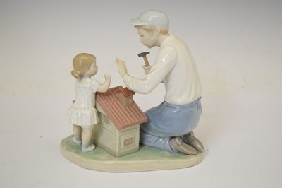 Lot 653 - Lladro - Porcelain figure group, 'A New Dolls House', 5139