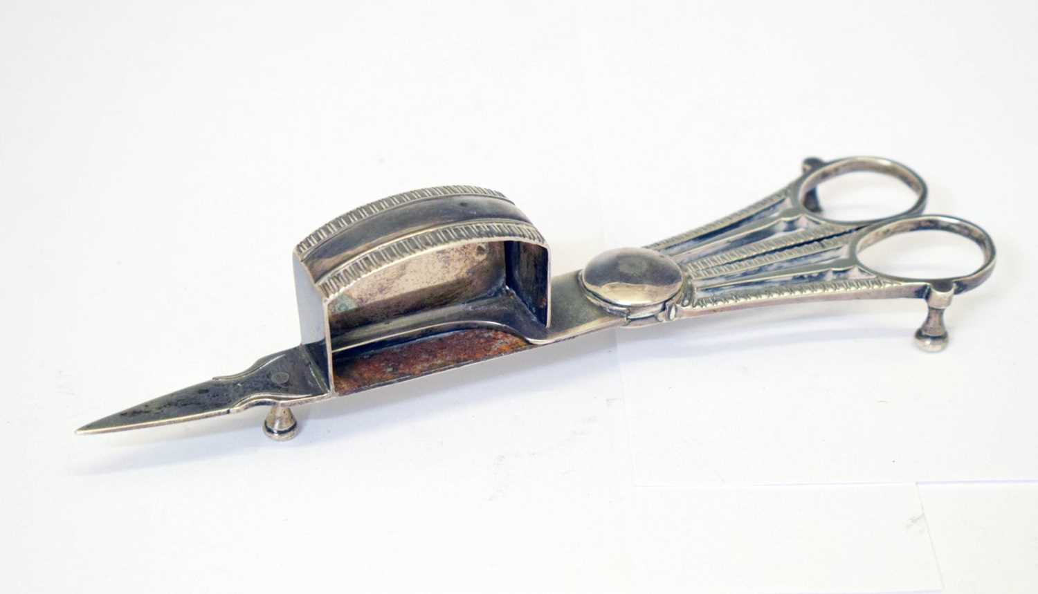 Lot 358 - Pair of George III silver candle snuffers
