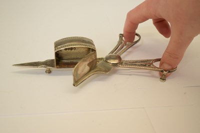 Lot 358 - Pair of George III silver candle snuffers