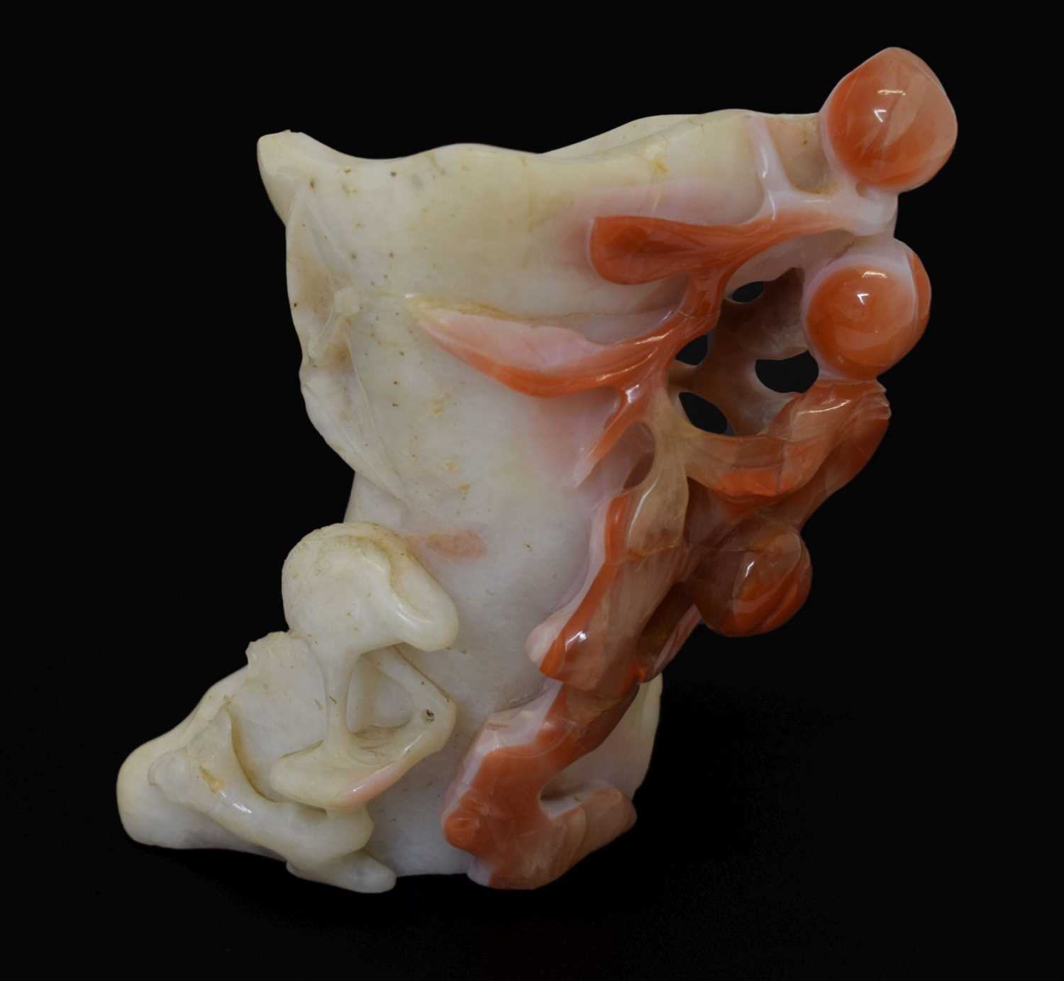 Lot 325 - Chinese carved carnelian agate 'Auspicious Fruits' vase
