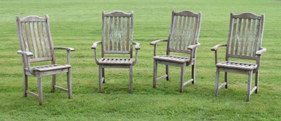 Lot 658 - Two pairs of Alexander Rose teak garden chairs