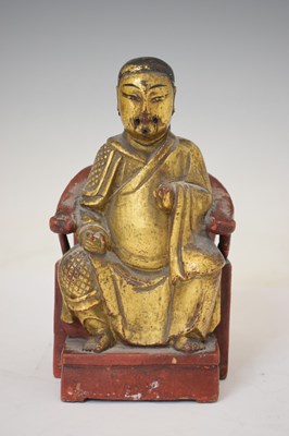 Lot 664 - Small 19th century Chinese Qing dynasty gilt and red lacquer wooden figure