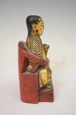 Lot 664 - Small 19th century Chinese Qing dynasty gilt and red lacquer wooden figure