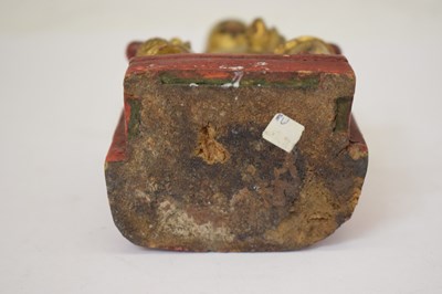 Lot 664 - Small 19th century Chinese Qing dynasty gilt and red lacquer wooden figure
