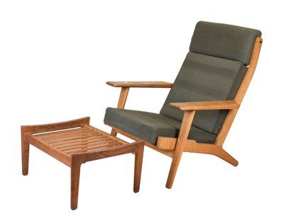 Lot 471 - Hans Wegner armchair and footstool