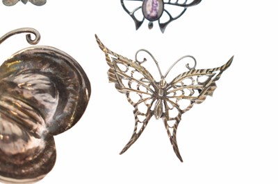 Lot 101 - Collection of seven butterfly brooches and a ruby set butterfly pendant necklace