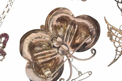 Lot 101 - Collection of seven butterfly brooches and a ruby set butterfly pendant necklace