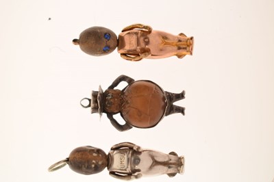Lot 237 - Two Great War era 'Fumsup' charms and a John Bull charm