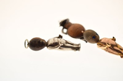 Lot 237 - Two Great War era 'Fumsup' charms and a John Bull charm