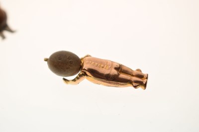 Lot 237 - Two Great War era 'Fumsup' charms and a John Bull charm