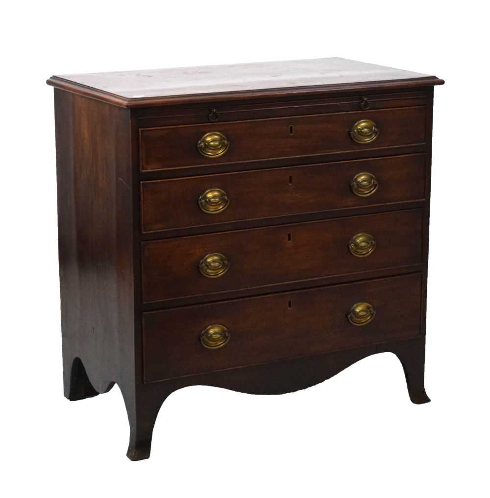 Lot 577 - Late George III mahogany chest of drawers with brushing slide