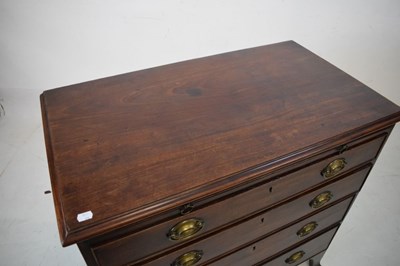 Lot 577 - Late George III mahogany chest of drawers with brushing slide
