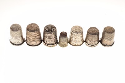 Lot 138 - Seven various silver and white metal thimbles