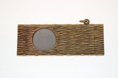 Lot 61 - Two 1960's 9ct gold cigar cutters