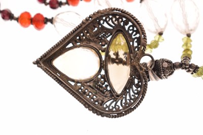 Lot 270 - In the manner of Stephen Dweck, a multi-gem set, etc