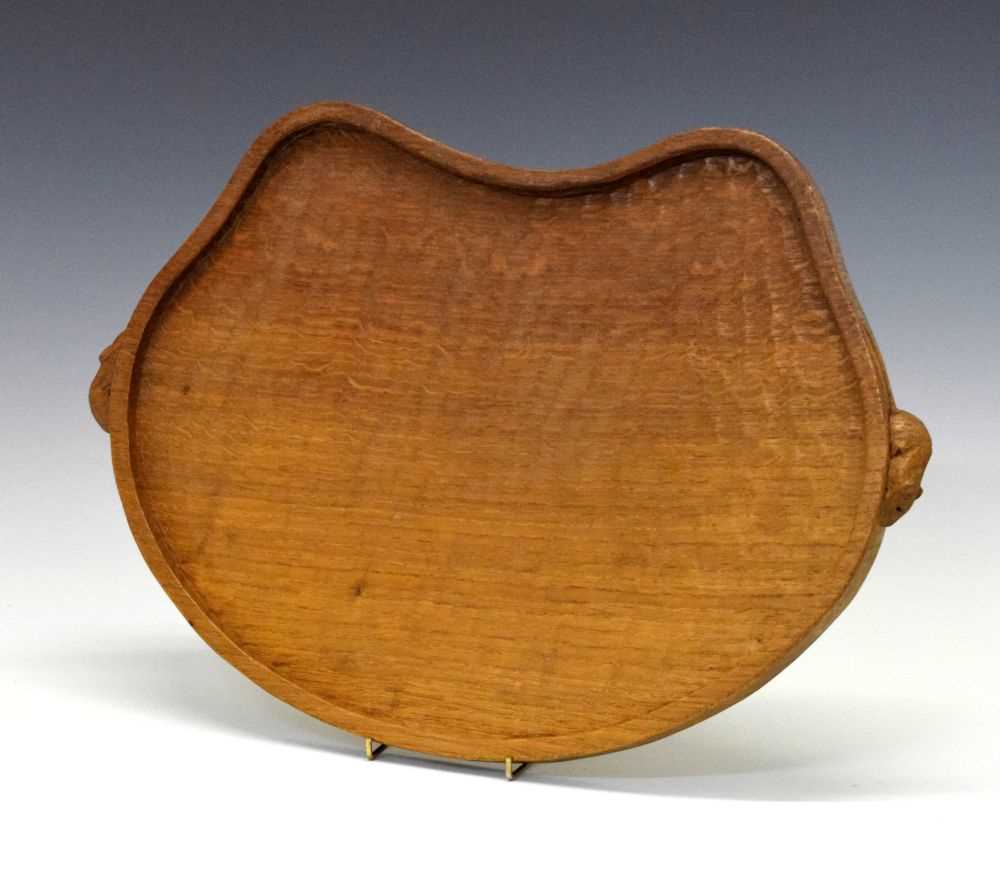Lot 297 - Workshop of Robert 'Mouseman' Thompson, late 20th Century English oak kidney-shaped tray